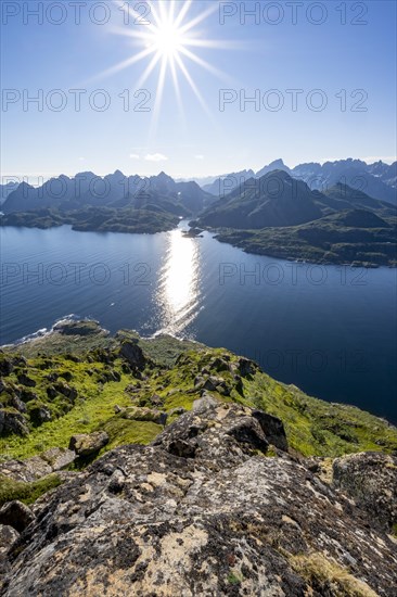 View of Ulvagsundet fjord and mountains, view from the summit of Dronningsvarden or Stortinden,
