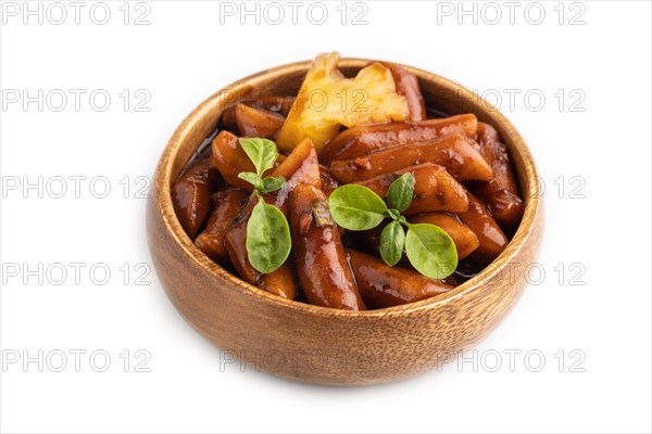 Tteokbokki or Topokki, fried rice cake stick, popular Korean street food with spicy jjajang sauce