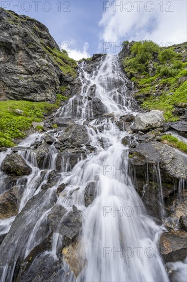 Waterfall on a mountainside, long exposure, Berliner Hoehenweg, Zillertal Alps, Tyrol, Austria,
