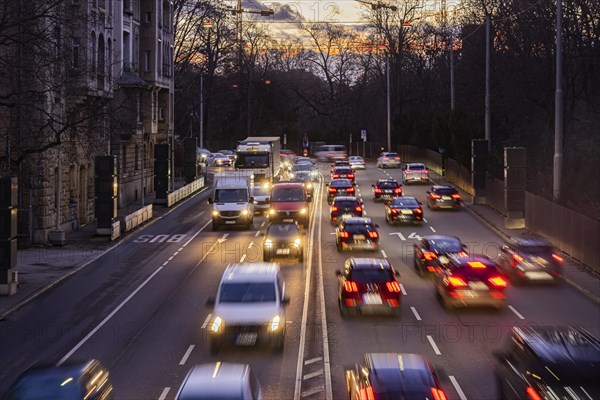 Cars with light trails in the evening, city centre traffic on busy B14 federal road at Neckartor,