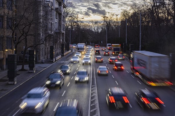 Cars with light trails in the evening, city centre traffic on busy B14 federal road at Neckartor,
