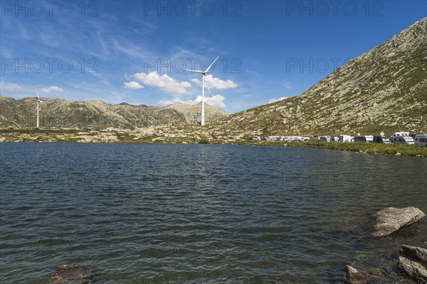 Gotthard Pass, Lago della Piazza at the top of the pass, wind turbines in the background, Canton