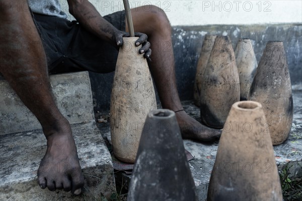 BARPETA, INDIA, NOVEMBER 7: Workers making firecrackers at a workshop for upcoming Diwali or
