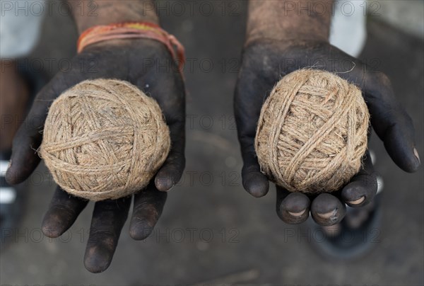 BARPETA, INDIA, NOVEMBER 7: Workers making firecrackers at a workshop for upcoming Diwali or