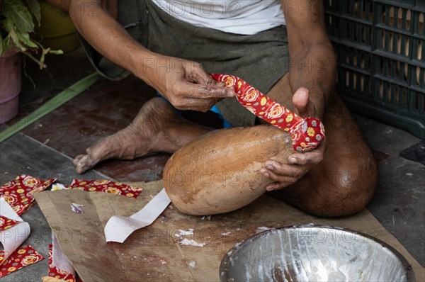 BARPETA, INDIA, NOVEMBER 7: Workers making firecrackers at a workshop for upcoming Diwali or