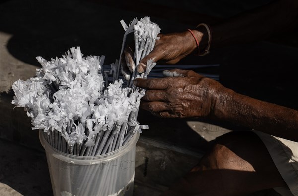 BARPETA, INDIA, NOVEMBER 7: Workers making firecrackers at a workshop for upcoming Diwali or