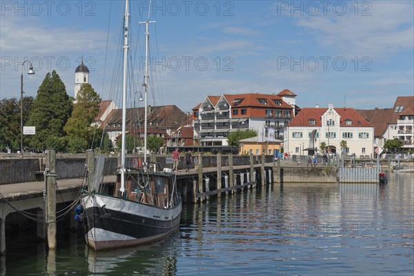 Langenargen on Lake Constance, townscape, harbour, cutter, quay wall, St. Martin's Church,
