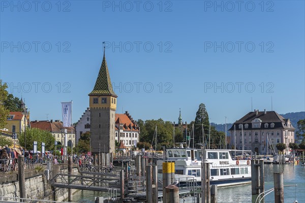 Lindau on Lake Constance, seaport, passenger ship, many holidaymakers, crowd, lakeside promenade,