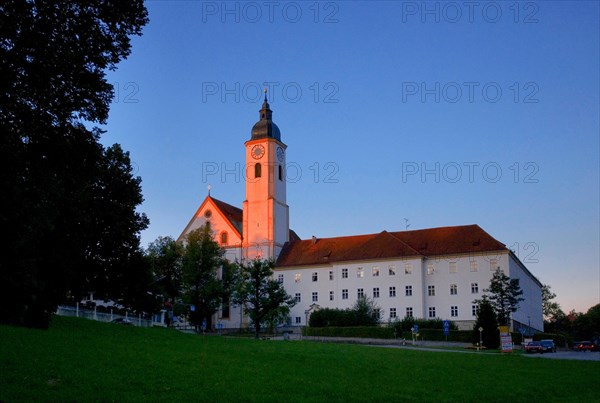 Monastery church Mariae Himmelfahrt in the evening sun, sunset, Dietramszell, Bavaria, Germany,