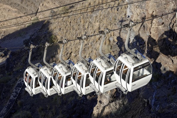 Fira, Santorini Island, Greece Close-up of cable car cabins from the old harbour