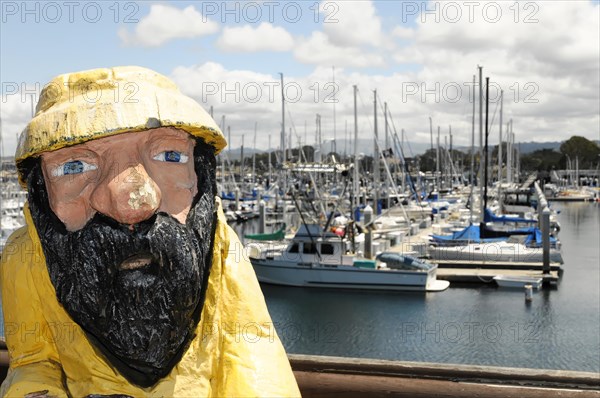 Fisherman, sculpture, wooden figure in the harbour, Monterey, California, USA, North America