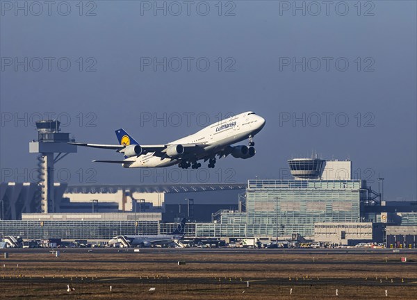 Aircraft taking off at Frankfurt Airport, Fraport Airport with tower. D-ABYH, LUFTHANSA, BOEING