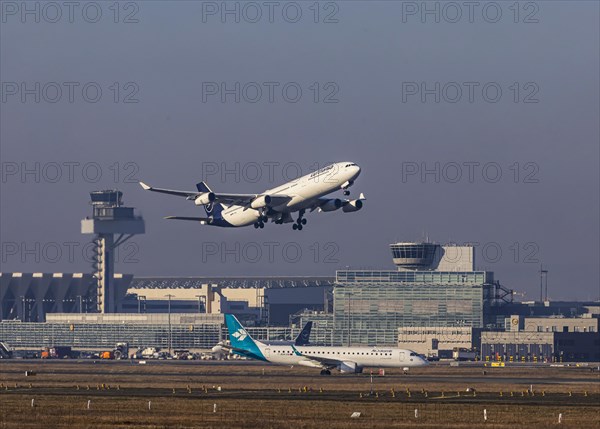 Aircraft taking off at Frankfurt Airport, Fraport Airport with tower. D-AIGL, LUFTHANSA, AIRBUS