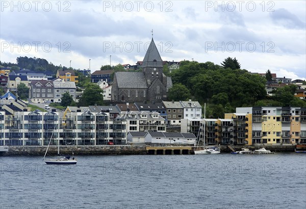 Houses and church in coastal town of Kristiansund, Romsdal county, Norway, Europe