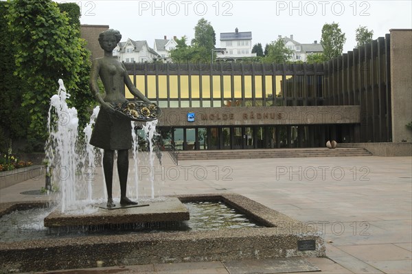Town hall 'Radhus' building in town centre of Molde, Romsdal county, Norway with water fountain