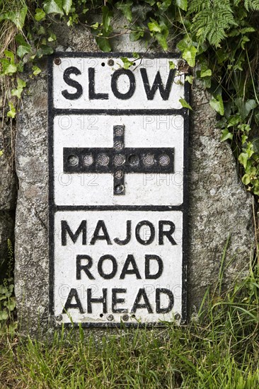 Old fashioned sign warning of major road junction ahead, St Keverne, Lizard peninsula, Cornwall,