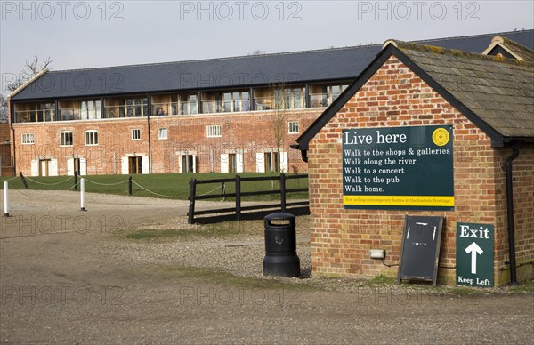 Former industrial buildings converted into housing for sale, Snape Maltings, Suffolk, England, UK
