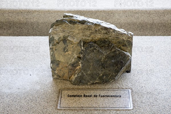Complex basal rock sample from Fuerteventura, geology display Casa de los Volcanes volcanic study