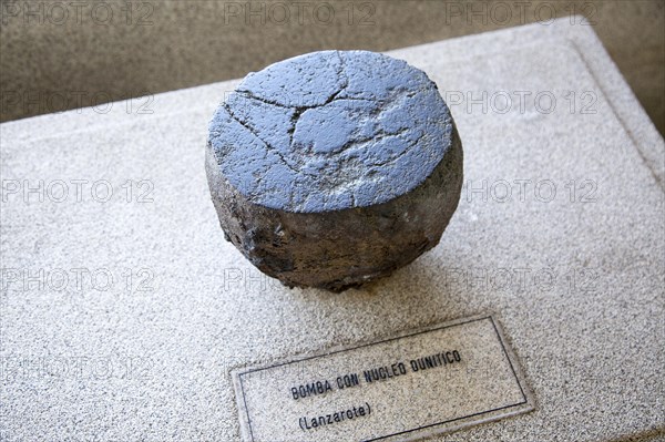 Volcanic bomb rock sample geology display, Casa de los Volcanes volcanic study centre, Lanzarote,
