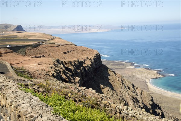 Steep coastal cliffs Risco de Famara looking south from the Mirador el Rio, Lanzarote, Canary