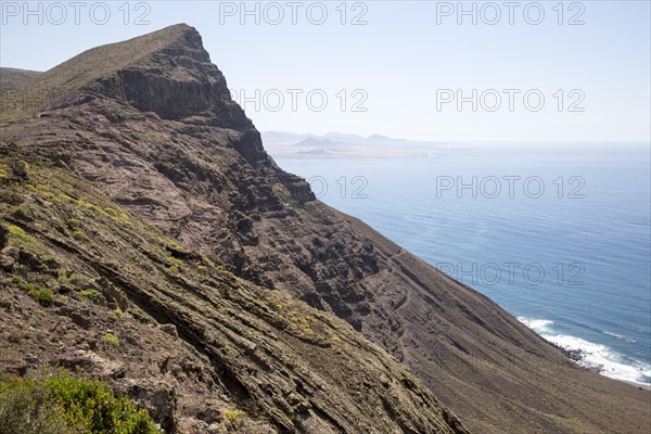 Steep coastal cliffs Risco de Famara looking south from Guinate, Lanzarote, Canary Islands, Spain,