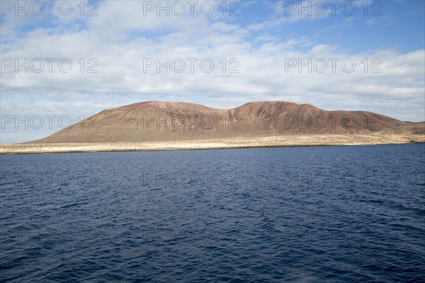 Agujas Grandes volcano, La Isla Graciosa from El Rio channel, Lanzarote, Canary Islands, Spain,