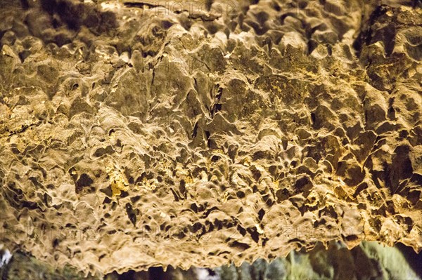 Lava stalactites on cave roof, Cueva de Los Verdes, cave tourist attraction in lava pipe tunnel,