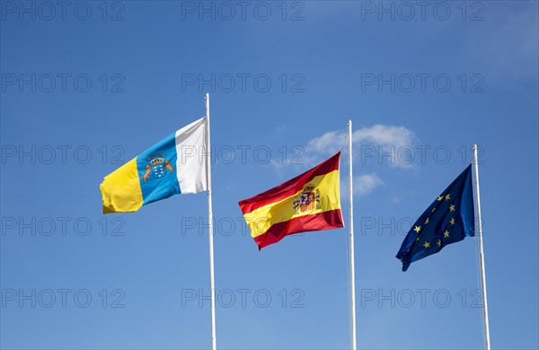 Flags of the European Union, Spain and Canary Islands flying at the airport, Lanzarote, Canary