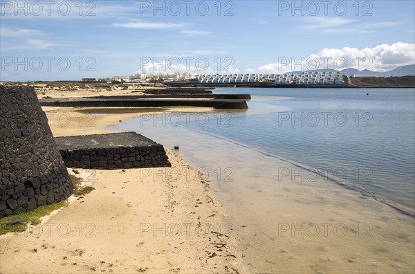 Lagoon at La Isleta, Lanzarote, Canary islands, Spain with large Club la Santa hotel in background