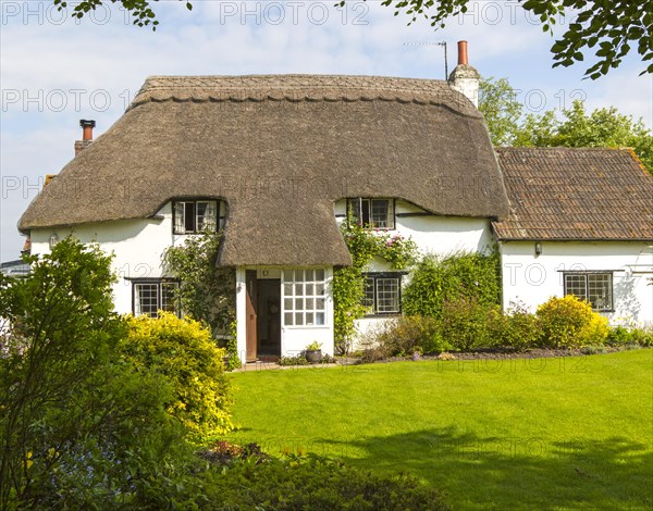 Pretty historic thatched cottage and garden, Cherhill, Wiltshire, England, UK