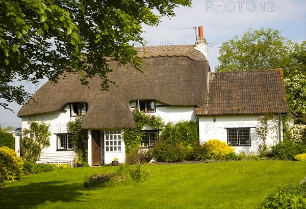 Pretty historic thatched cottage and garden, Cherhill, Wiltshire, England, UK