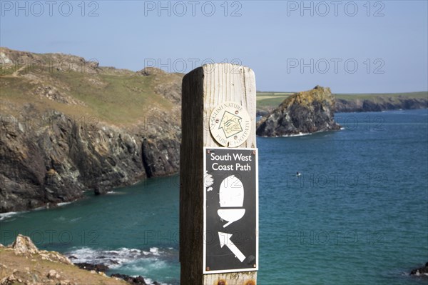 South West coast path waymark sign near, Kynance Cove, Lizard peninsula, Cornwall, England, UK