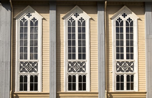 Detail of wood windows, historic wooden cathedral church in city centre, Tromso, Norway, Europe