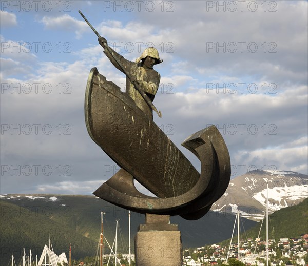 Whaling harpooning sculpture in harbour at Tromso, Norway, Europe