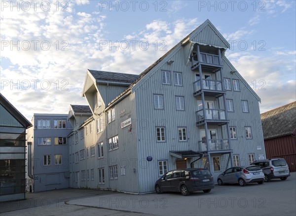 Waterside old warehouse wooden buildings harbour area, Tromso, Norway, Europe