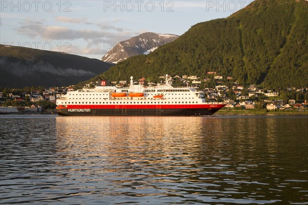 Hurtigruten ferry ship Nordlys approaching Tromso, Norway, Europe