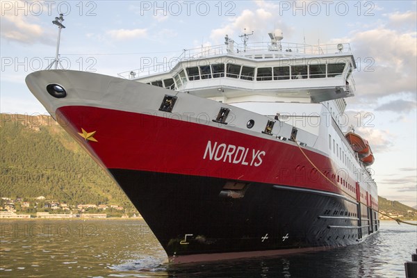 Hurtigruten ferry ship Nordlys approaching Tromso, Norway, Europe