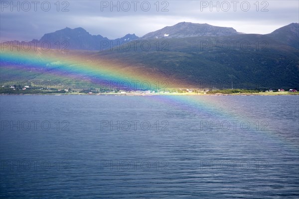 Rainbow over sea near Stokmarknes, Hadsel municipality, Hadseloya island, Nordland, Vesteralen