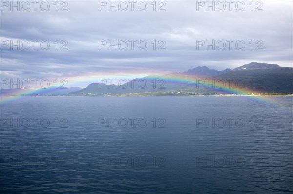 Rainbow over sea near Stokmarknes, Hadsel municipality, Hadseloya island, Nordland, Vesteralen