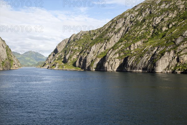 Steep sided glacial trough fiord of Trollfjorden, Lofoten Islands, Nordland, northern, Norway,