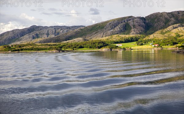 Rural coastal farming landscape near Rorvik, Norway, Europe