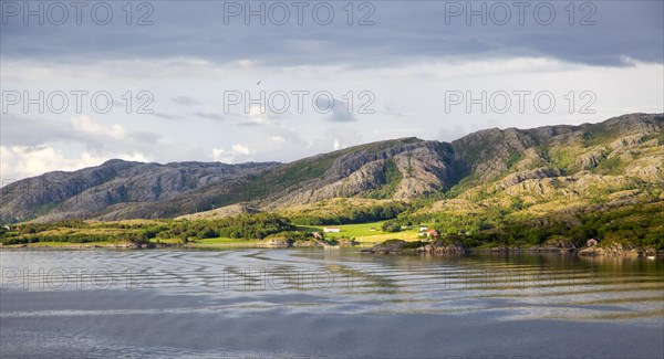 Rural coastal farming landscape near Rorvik, Norway, Europe