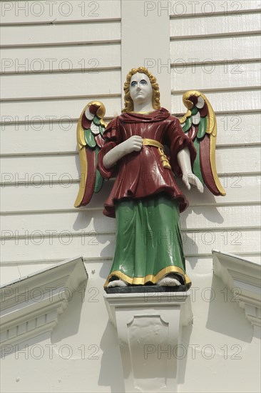 Wooden angel figure in Bryggen area, Bergen, Norway UNESCO World Cultural Heritage site