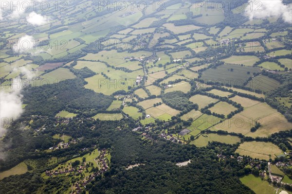 A patchwork of fields seen from the air near Gatwick airport, London, England, UK