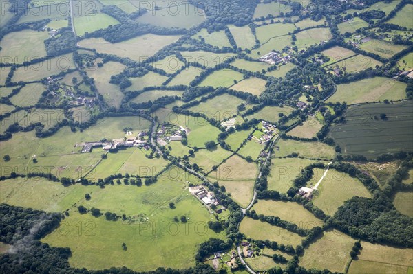 A patchwork of fields seen from the air near Gatwick airport, London, England, UK