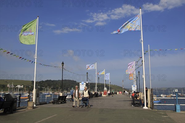 Flags flying on Prince of Wales pier, Falmouth, Cornwall, England, UK