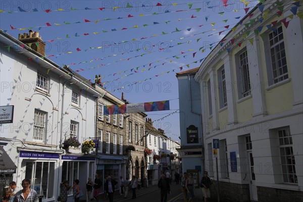 Bunting flags flying in street of town centre, Falmouth, Cornwall, England, UK