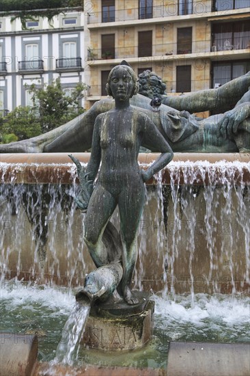 La Fuente del Turía, water fountain and statues commemoration of Turia river, Plaza de la Virgen,