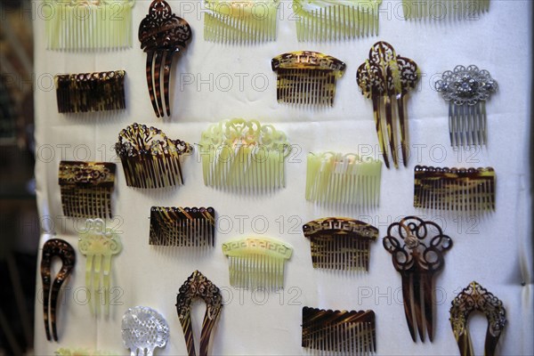Traditional Spanish hair combs in shop window, city of Valencia, Spain, Europe