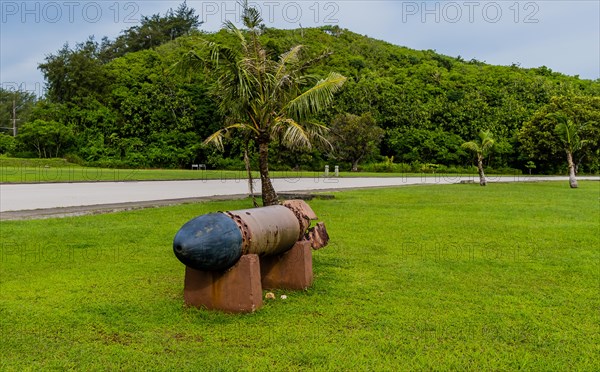 Side view of WWII torpedo in a public park in Guam